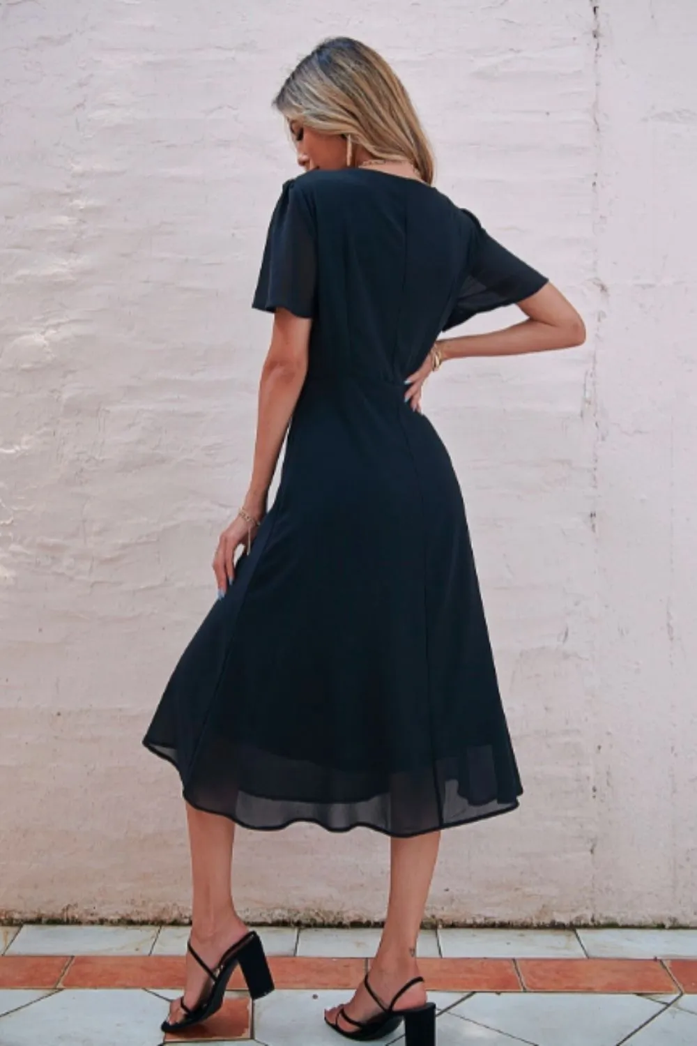 Plunge neck black georgette dress