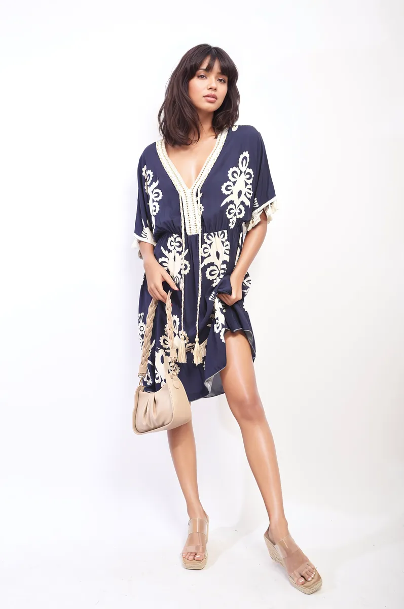 Printed V-Neck Short Sleeve Midi Dress with Tassel Detail