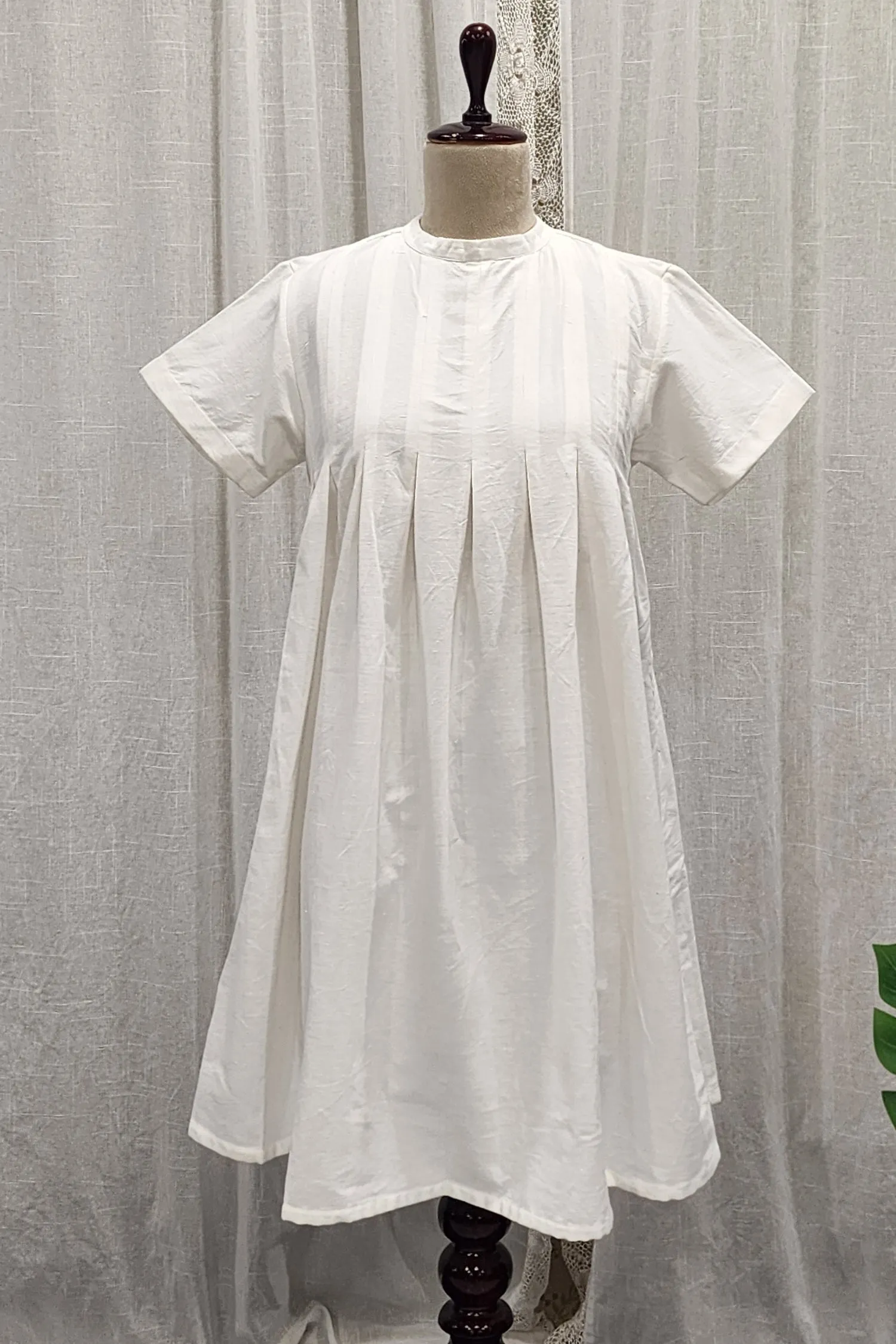 White handspun and handwoven pleated tunic